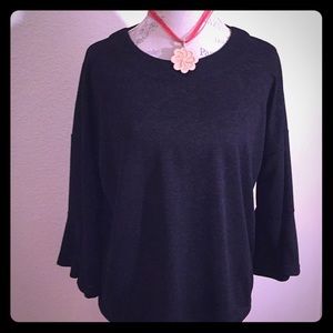New with tags .Beautiful Boho Style Black Blouse.